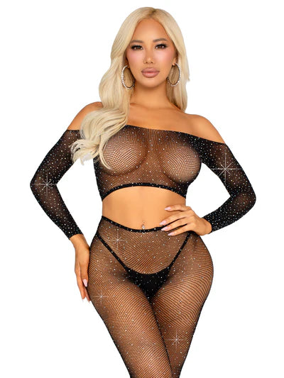 Woman wearing a black fishnet outfit with long sleeves on a white background
